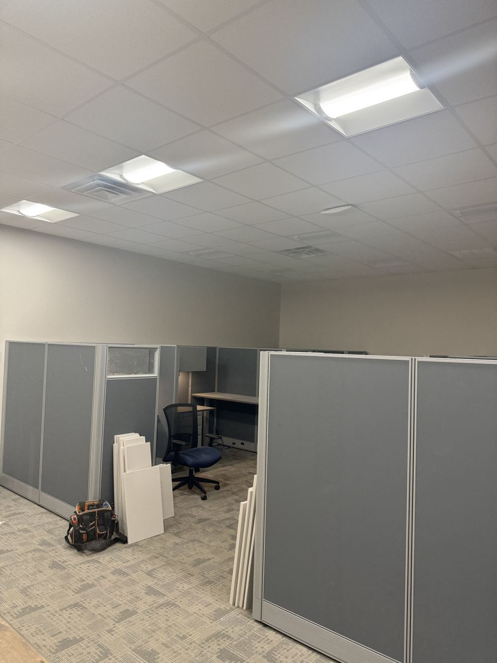 Commercial cabinetry sprayed and finished in gray