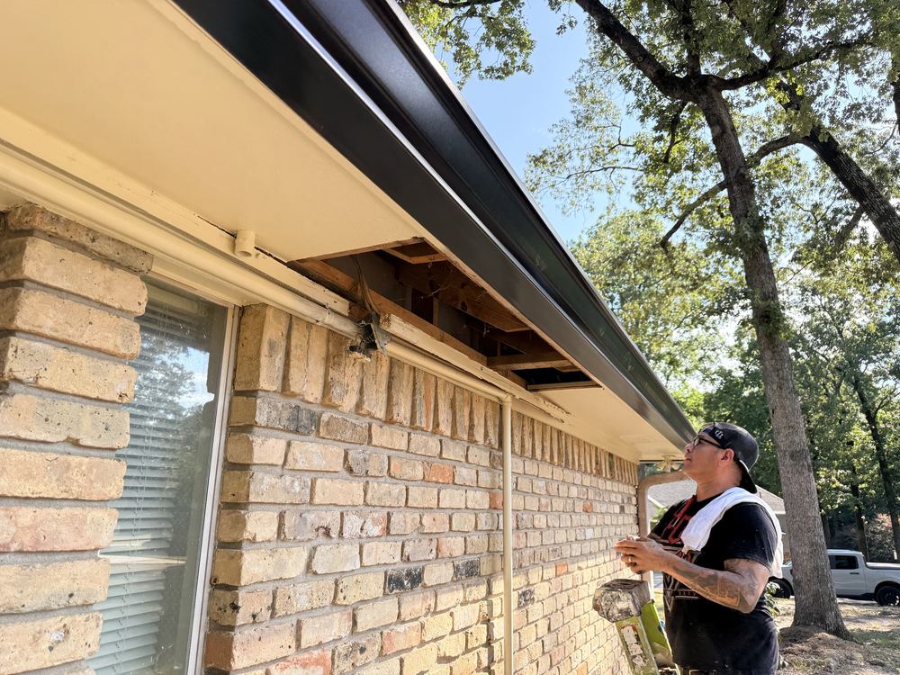 Fascia and soffit rot repair on brick home exterior