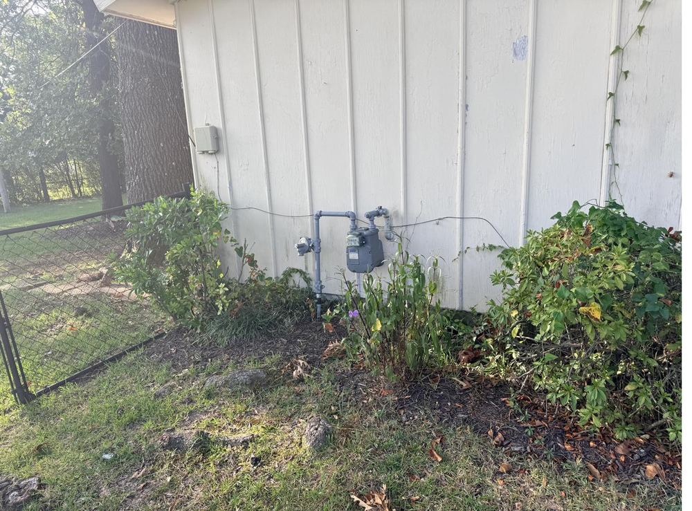 Weathered siding before exterior painting in Texarkana TX